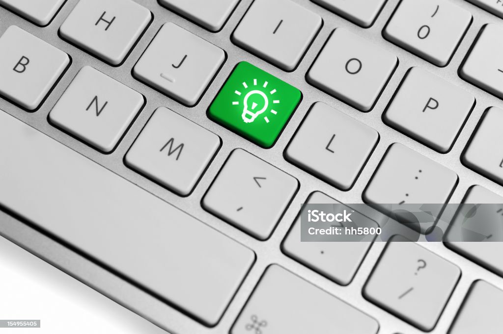 Green Light bulb online innovation Idea computer key  Laptop Stock Photo