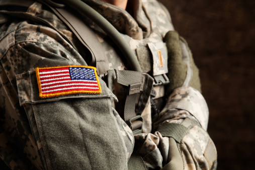 US Army soldier in universal camouflage uniform. 