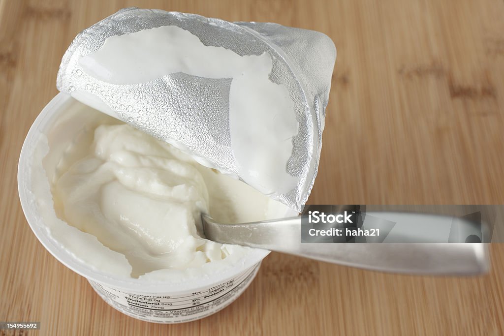 Griechischer Joghurt mit Löffel - Lizenzfrei Joghurt Stock-Foto