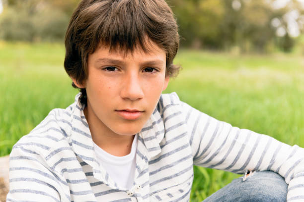 Portrait of an adorable little boy playing outside