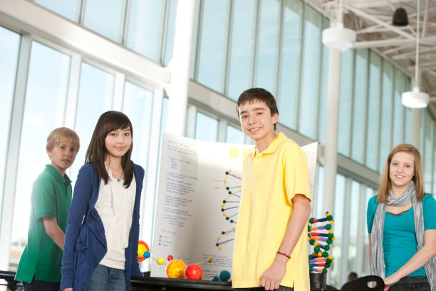 School Science: Students Learn with Science Fair Project  school science project stock pictures, royalty-free photos & images