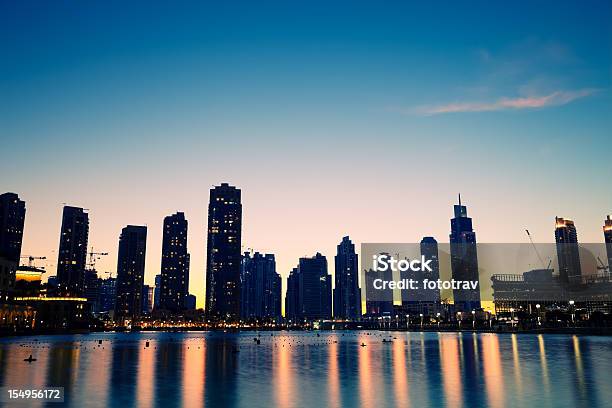 City Skyline From Dubai Mall By Night Stock Photo - Download Image Now - Night, Shadow, Wealth