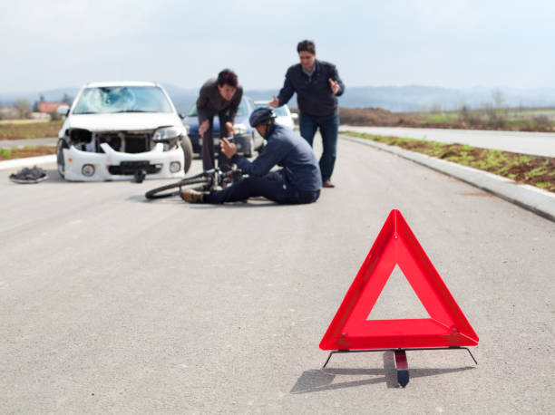 istock Road accident. Cyclist and a car 154956253