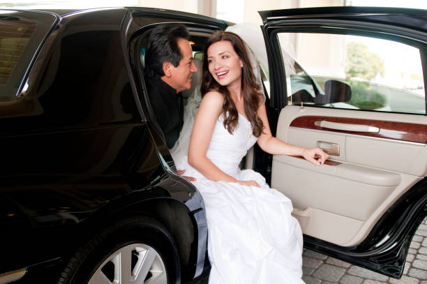 istock Bride and Groom in a Luxury Automobile 154956297