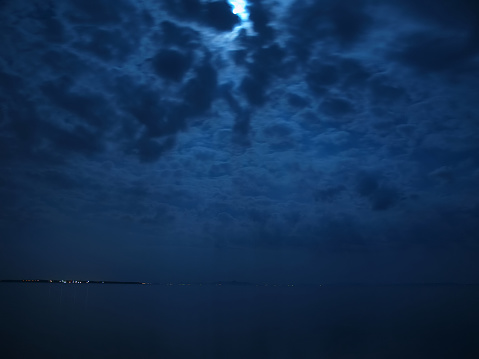Moon light glistening off the sea, Adriatic coastline, Dalmatia, Croatia, very long exposure.