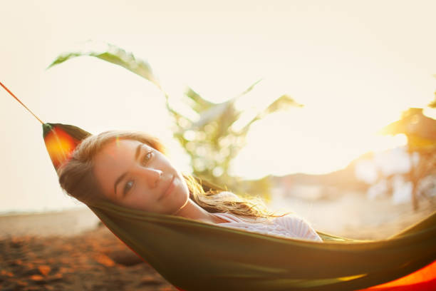 istock Young Woman in Hammock 154958884