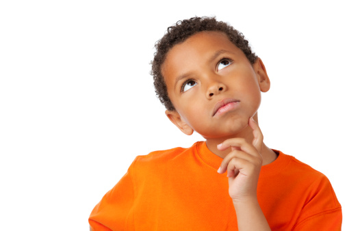 Serious 8-year old mixed race boy thinkingl, isolated on white. You might also be interested in these: