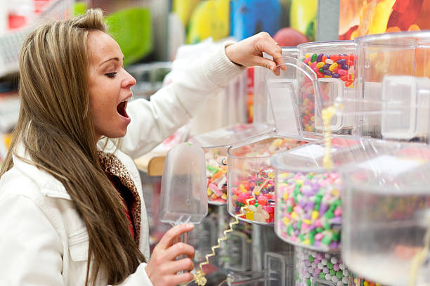 istock Young Woman Shopping for Candies 154959352