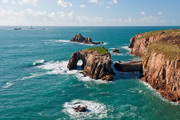 A wide angle view of the dramatic cliffs and rocks of Lands End, Cornwall, England