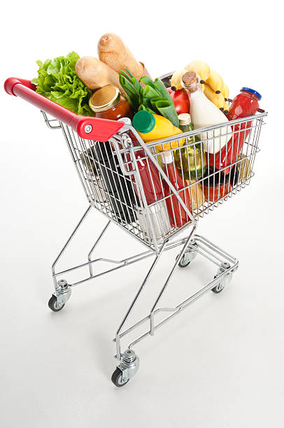 istock Grocery cart filled with staples 154959424