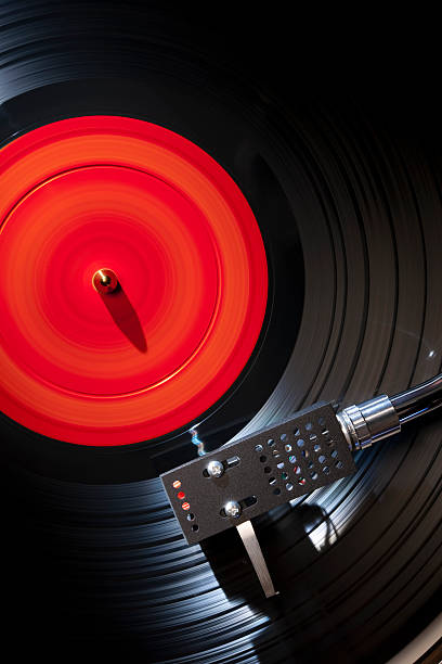 Last Song Vinyl Record Playing on a Vintage Turntable. retro turntable stock pictures, royalty-free photos & images