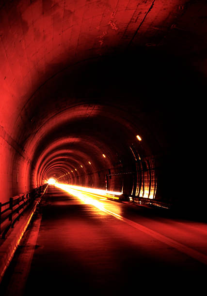 istock Motion of Headlight in deep tunnel 154959766
