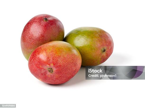 Tres Mangos Foto de stock y más banco de imágenes de Mango - Fruta tropical - Mango - Fruta tropical, Tres objetos, Recortable