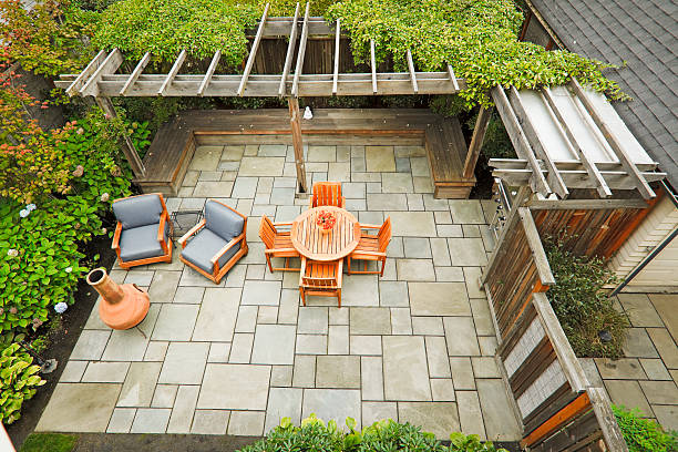 Outdoor Living Looking down on a cozy outdoor living patio. trellis photos stock pictures, royalty-free photos & images