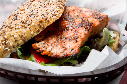 Grilled Salmon Sandwich on Sesame seed and poppy seed bun