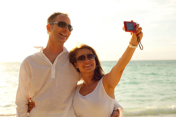 istock couple vacation shot on the beach 154960443