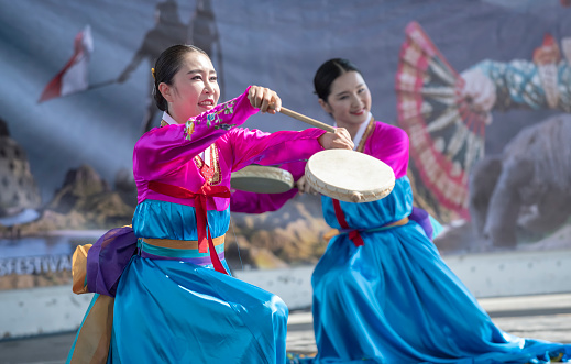 Los Angeles, CA, USA - July 15, 2023: 42nd Lotus Festival in Echo Park celebrating the culture of Indonesia. Korean dancers with drums Participate in the the Echo Park Festival \nShowcasing the cultures of Asia.