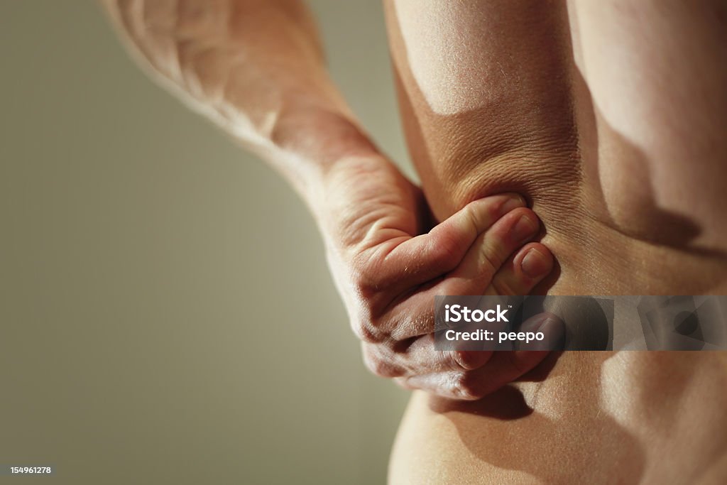 Homem com dor nas costas nuas - Royalty-free Cuidados de Saúde e Medicina Foto de stock