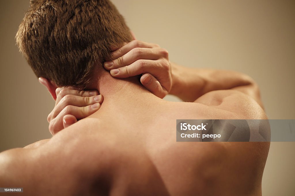 Mann mit Schmerzen Nacken - Lizenzfrei Männer Stock-Foto