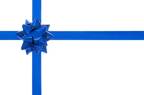 Photo of Blue present bow and ribbon, isolated on white