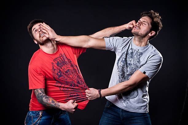 Two guys fighting. stock photo