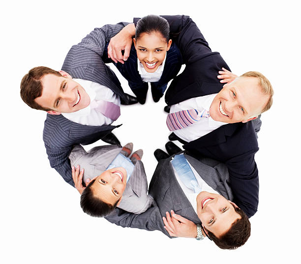istock Smiling Businesspeople Huddled Together - Isolated 154961788