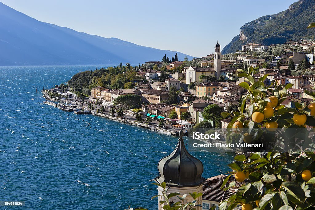 Lemon on Garda, Italy Limone sul Garda is a small town on the Brescia side of Lake Garda, nestled between the lake and the mountains, famous for its lemon groves, for the prized olive oil and the wonderful landscapes.  Limone Sul Garda Stock Photo