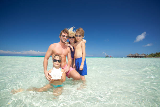 istock young family in lagoon 154961909