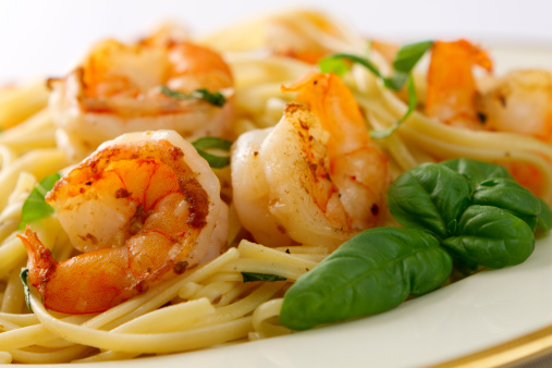 A basil infused version of the classic shrimp scampi served with linguini.