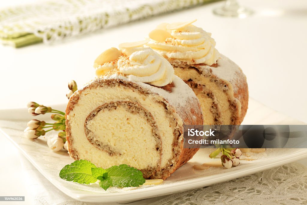 Nut and cream cake roll Slices of nut and cream cake roll Swiss Roll Stock Photo
