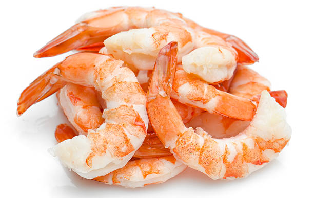 Heap of shrimps Heap of shrimps on white background (this picture has been taken with a Hasselblad H3D II 31 megapixels camera) tail fin photos stock pictures, royalty-free photos & images