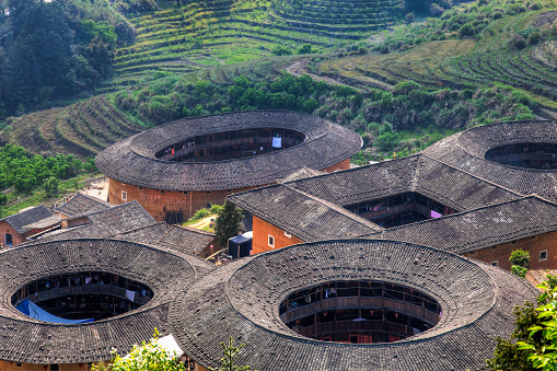 The Fujian Tulou (or Earth Houses) are traditional housing in Hakka Villages in Fujian Province of China.

Here is the Tianluokeng village

They have been classified in 2008 as World Heritage by the UNESCO.


[url=http://www.istockphoto.com/search/lightbox/12058248#1950594e][img]https://dl.dropbox.com/u/61342260/istock%20Lightboxes/Shanghai.jpg[/img][/url]

[url=http://www.istockphoto.com/file_search.php?action=file&lightboxID=6668404&refnum=fototrav][img]https://dl.dropbox.com/u/61342260/istock%20Lightboxes/p505501680.jpg[/img][/url]

[url=http://www.istockphoto.com/search/lightbox/12650990#a7d4d9b][img]https://dl.dropbox.com/u/61342260/istock%20Lightboxes/Skyline.jpg[/img][/url]

[url=http://www.istockphoto.com/search/lightbox/7990705/?refnum=fototrav#1609603d][img]http://bit.ly/13poUtx[/img][/url]

[url=http://www.istockphoto.com/search/lightbox/7294633/?refnum=fototrav#b7fe73b][img]https://dl.dropbox.com/u/61342260/istock%20Lightboxes/Night2.jpg[/img][/url]