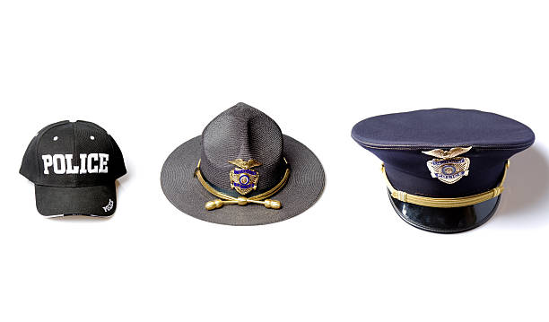 полицейский hat selection - sheriffs deputy стоковые фото и изображения