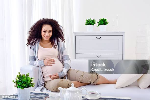 Waiting For A Newborn Child Stock Photo - Download Image Now - Pregnant, African Ethnicity, One Woman Only