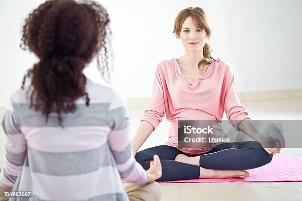 Pregnant Women Doing Yoga Stock Photo - Download Image Now - 20-24 Years, Abdomen, Adult