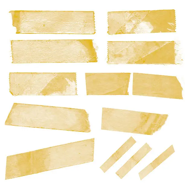 Photo of Collection of old sticky tape on a white background