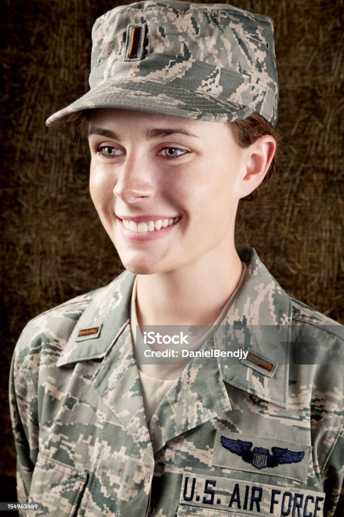 US Air Force Series: American Airwoman Smiling Portrait of a female US Air Force airwoman in airman battle   uniform or ABU. Veteran Stock Photo