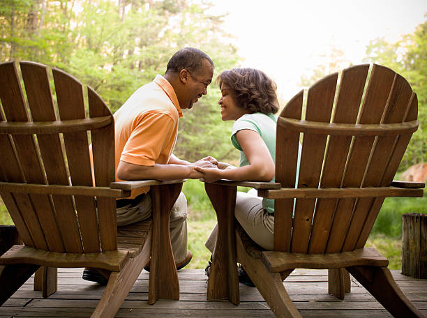 istock Adirondack Couple Sitting Face to Face 154963464
