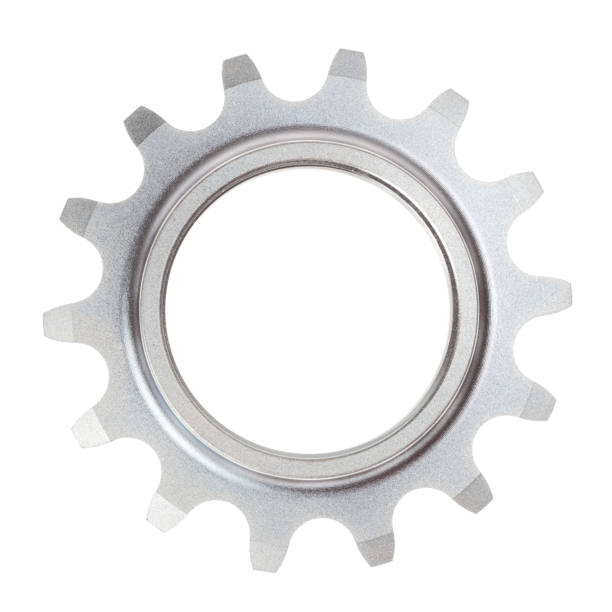 A single metal cog on a white background stock photo