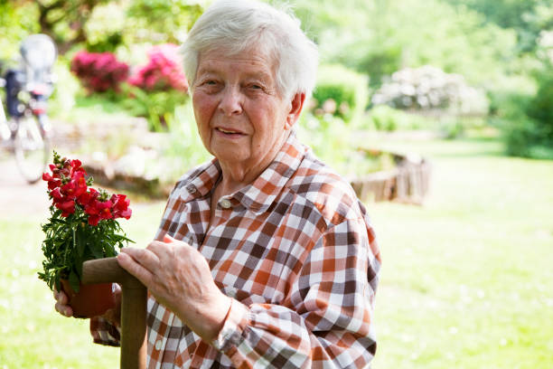 istock senior woman gardening 154963719