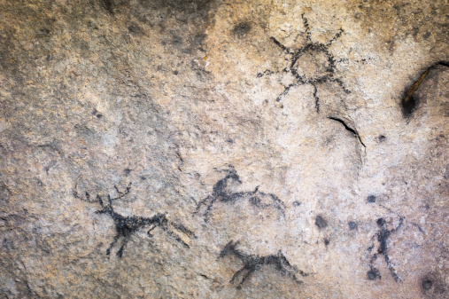 faked cave paintings on a sandstone wall in saxon switzerland, elbsandsteingebirge