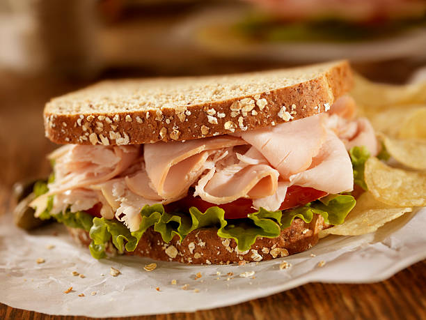 スモークターキーのサンドイッチ - turkey sandwich ス�トックフォトと画像