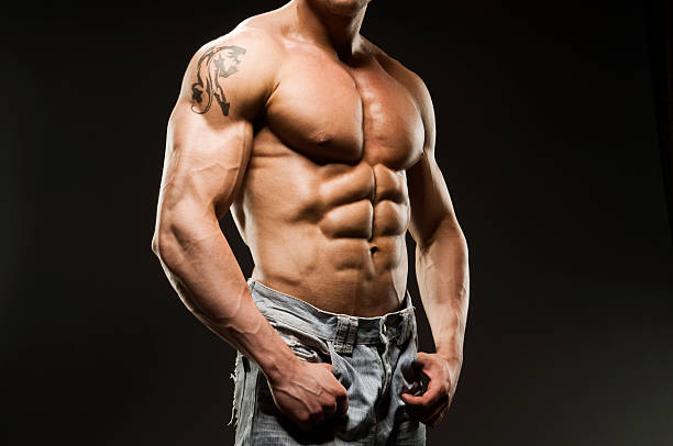 istock Muscular Male Torso in blue jeans 154964152