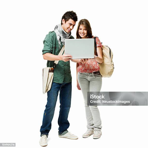 Estudantes A Olhar Para Um Computador Portátilisolada - Fotografias de stock e mais imagens de Pessoa a Estudar