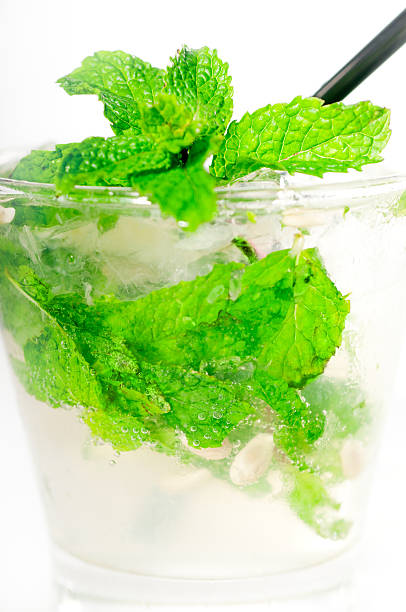 istock mojito caipirina cocktail with fresh mint leaves 154964778