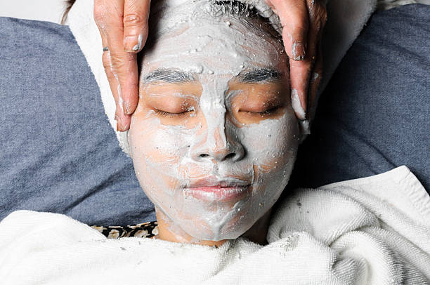 istock Charcoal facial massage 154964956