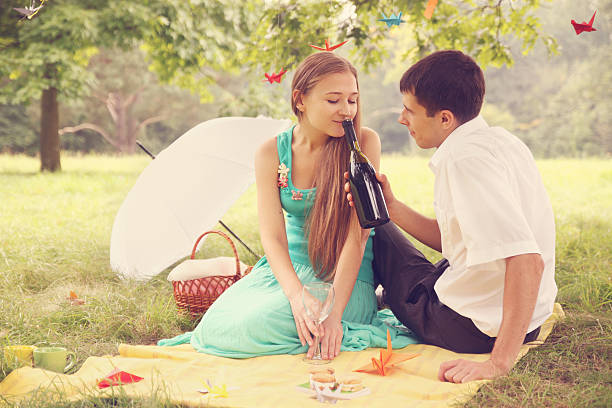 woman 香りのワイン - couple young women cheerful outdoors ストックフォトと画像