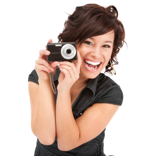 istock Attractive Young Woman Having Fun with Digital Camera 154966318