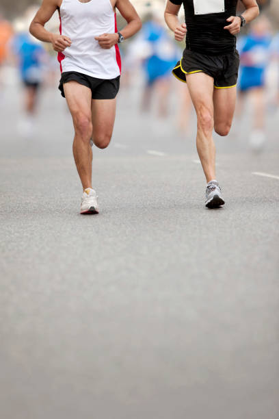 istock Two runners leading on city marathon 154966484