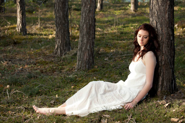 Young woman relaxing in the forest